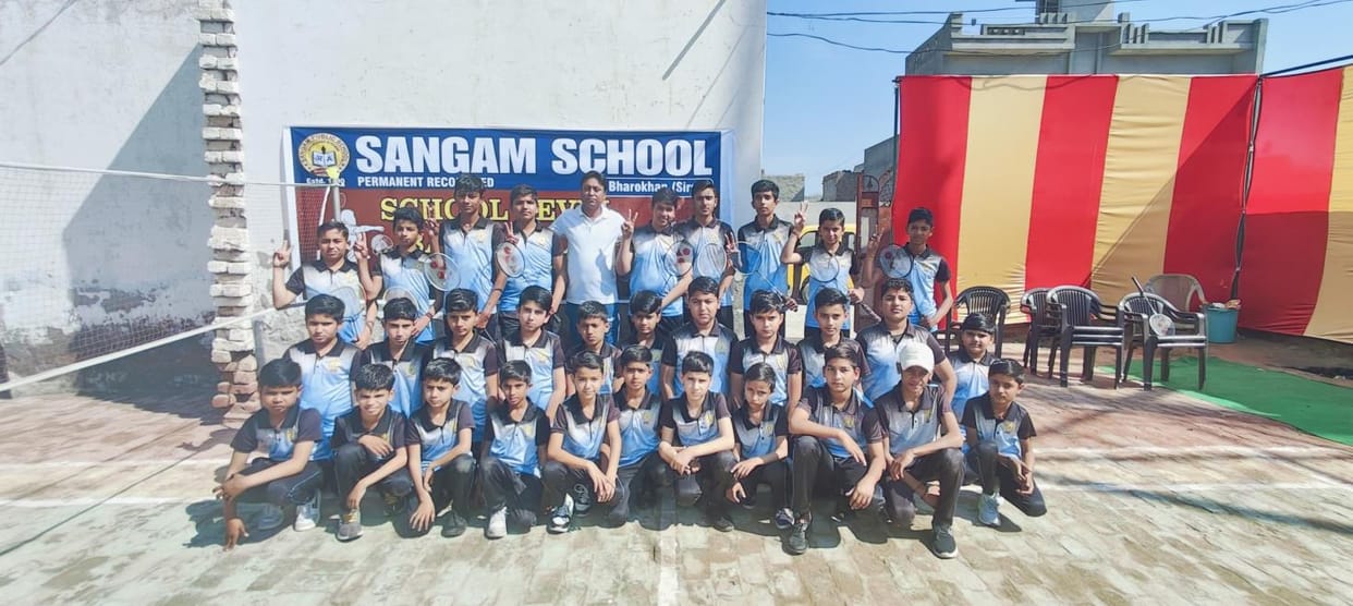Players and others present during the school level badminton competition at Sangam School Bharokhan.