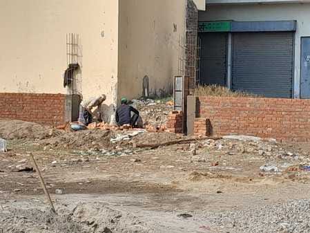 Construction of boundary wall of dilapidated Sahaswan bus station begins