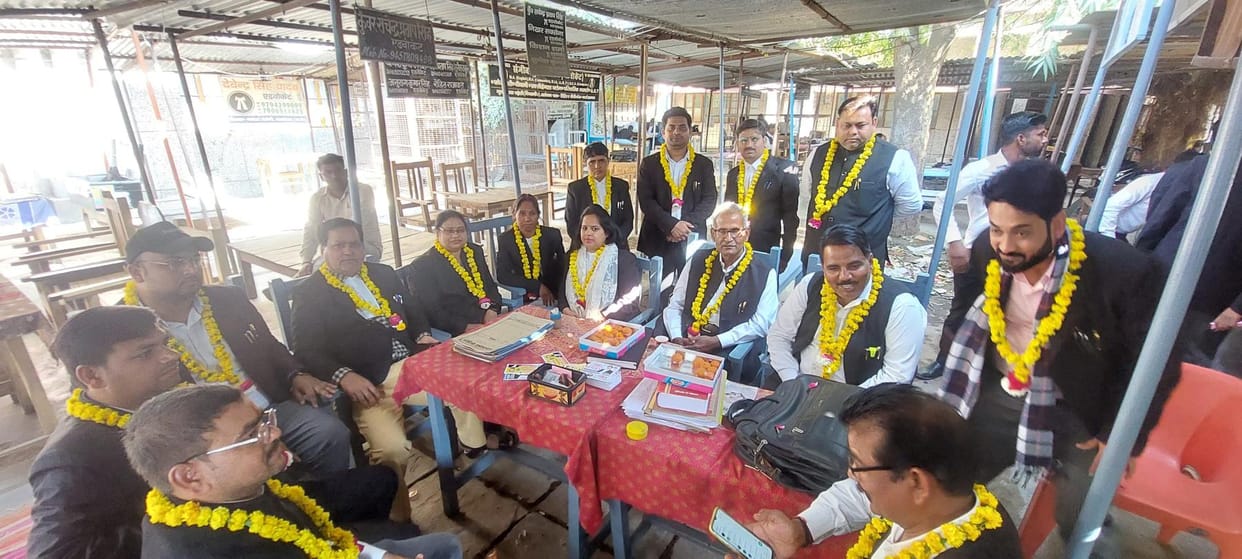 Officials elected unopposed were honored in the court