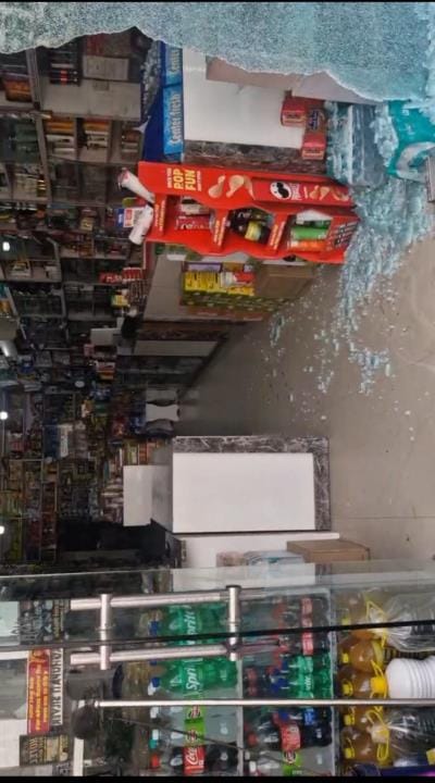An old man's life was in danger in a bull fight, the shop gate was broken