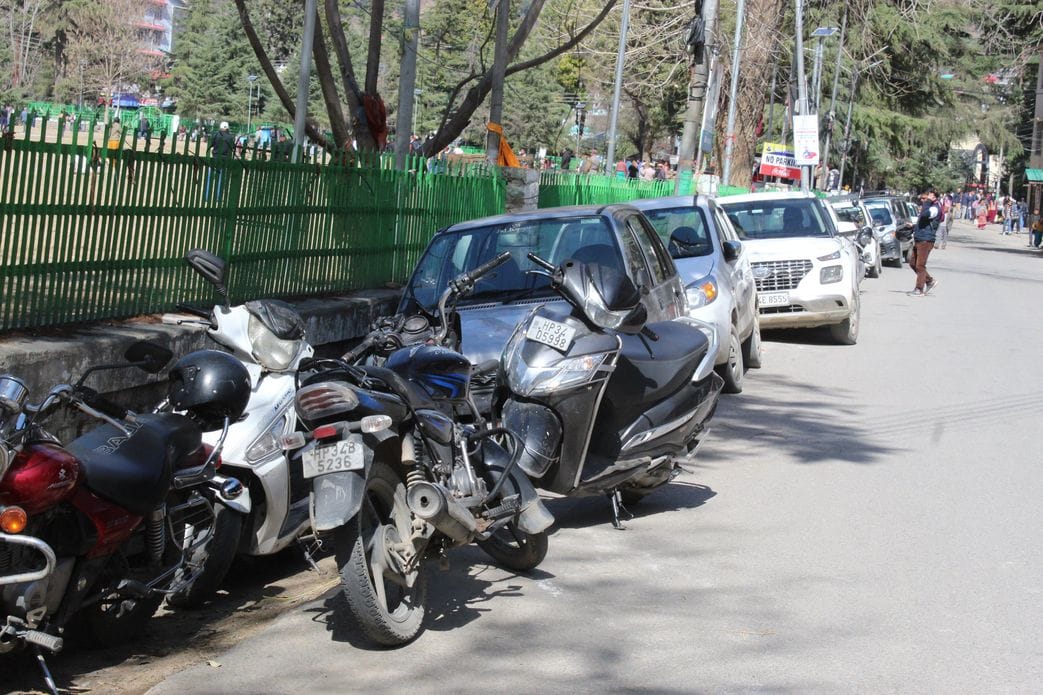 Parking has become small, vehicles parked sideways are causing traffic jams.