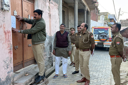 Attachment notice pasted at the house of the main accused