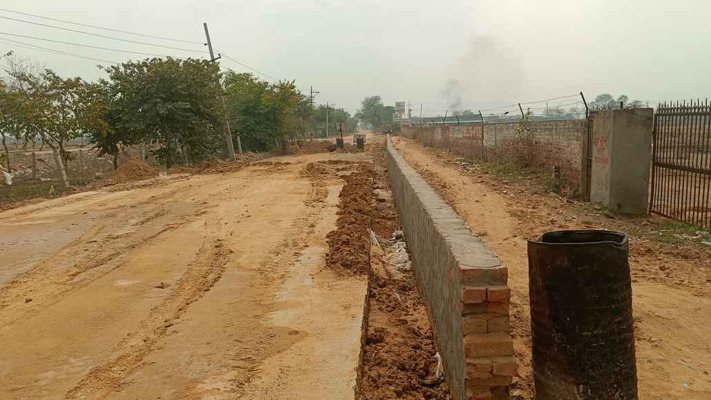 Dispute regarding space during road construction on Bighad Road, wall built along with it
