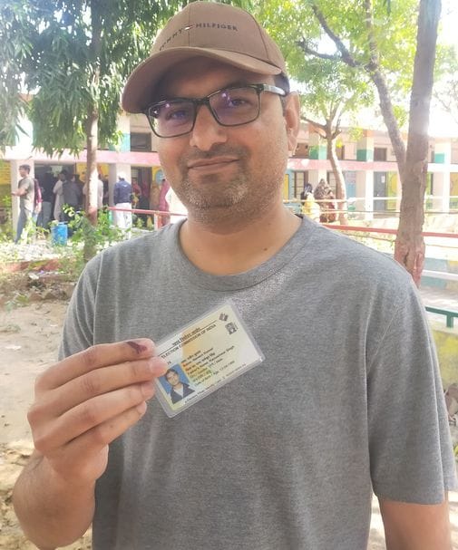 Naveen came from America to vote in municipal elections