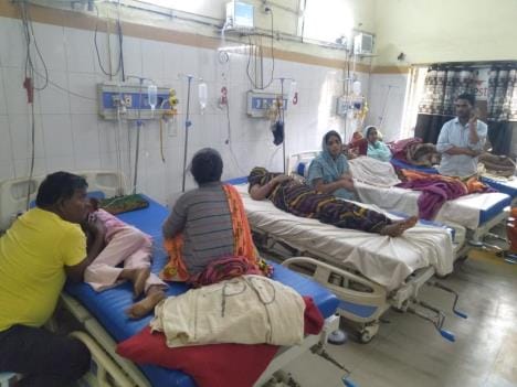 Woman dies of fever, 12 people admitted