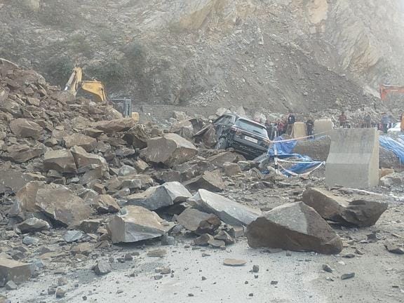 Stones fell near four miles, tourists in two cars ran away and saved their lives.