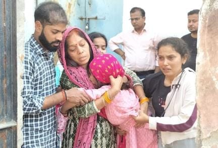 A song was playing on the mobile... Congratulations on your wedding... The body of a health worker was found hanging in the room
