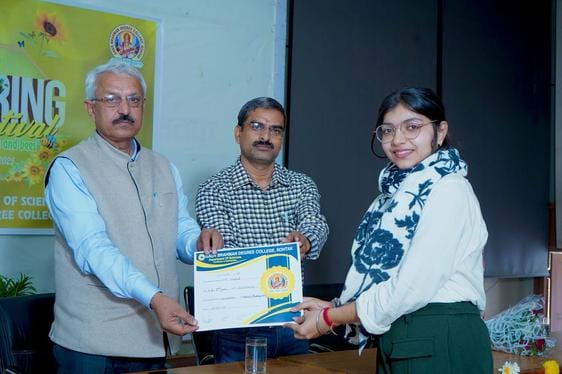 Komal won the first prize in the rangoli competition