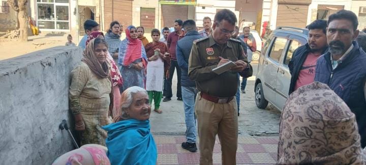 Gold earrings were snatched from an elderly woman sitting outside her house in Jakhal