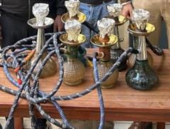 Raid in Purple Frog Club, seven hookahs including chillum recovered, two arrested