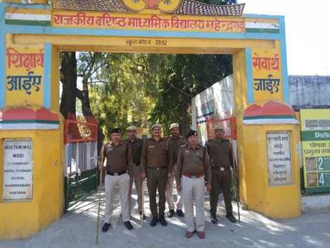 Police guard the centers for cheating free examination