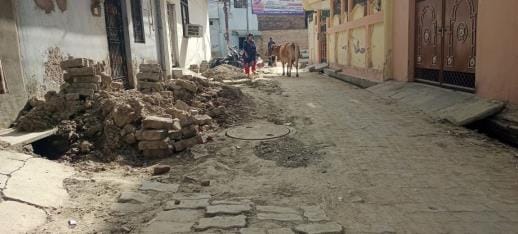 Sewer line was laid, no connection was given nor road was built