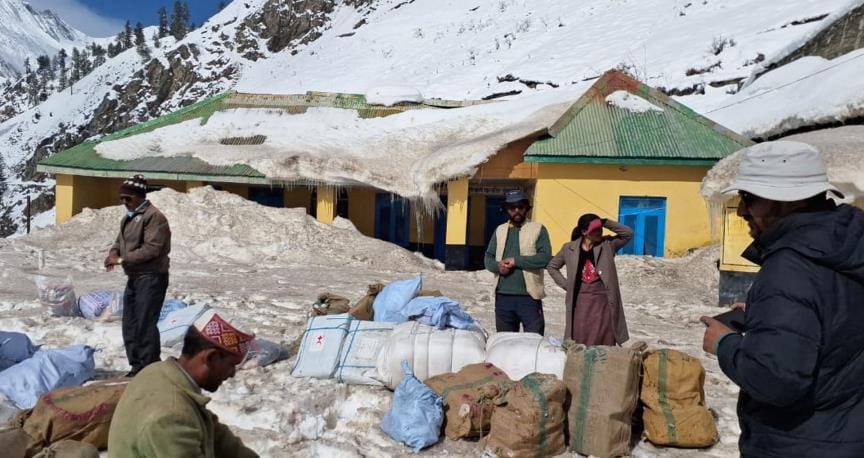 Relief material dropped from helicopter in Kumar of Pangi