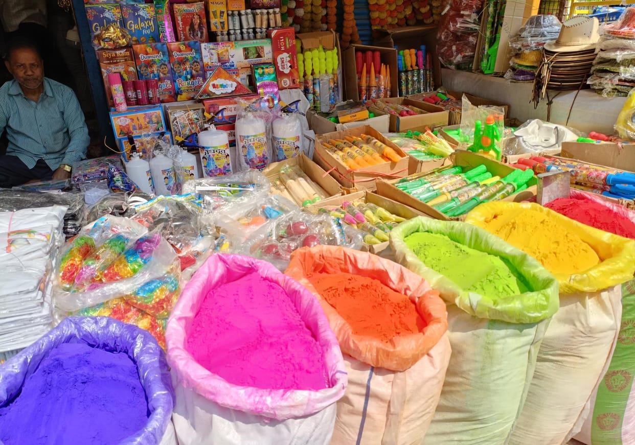 Markets are buzzing on the occasion of Holi festival, shops selling water guns are decorated