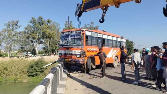 The bus going to Singa collided with the railing of Santoshgarh bridge, stuck in mid air.