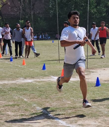 Naveen and Isha of B second year came first in 100 meter race