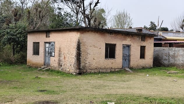 Cracks in the walls of Bharmad Patwar Khana, plaster falling from the ceiling