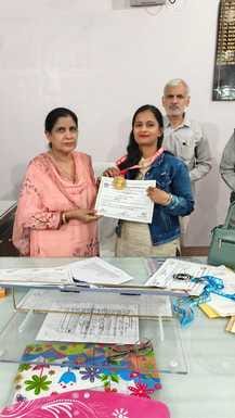 District Education Officer honored Yoga Champion Yashoda Arya