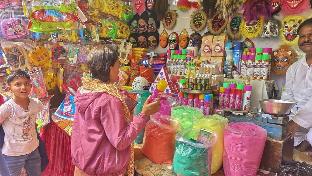 Shopping for abir-gulal is in full swing in the market