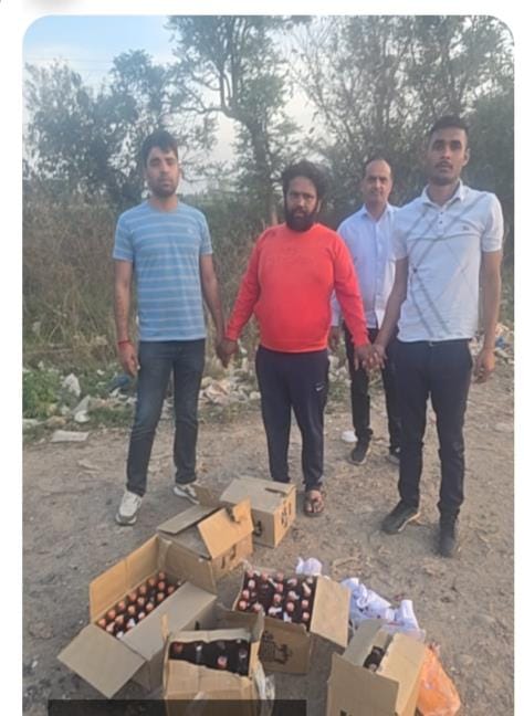 He was selling liquor by hiding it in the bushes on the river bank, detective staff caught him