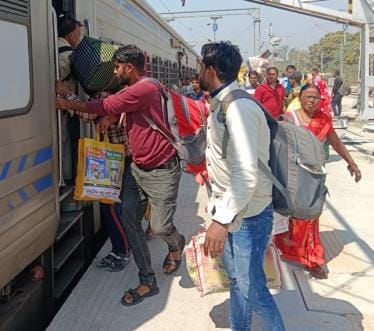 Trains are jam packed, there is a fight to get on and off
