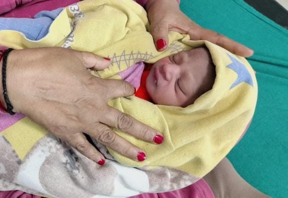 A newborn baby girl was found in a garbage heap in an empty plot in Dhakoli