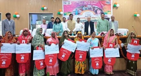 Women's faces lit up after getting free gas cylinders on Holi