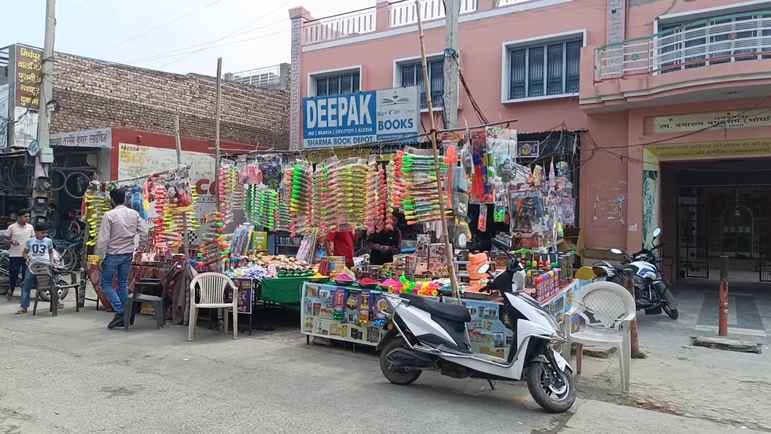 The market is buzzing with the festival of Holi