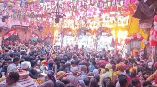 Devotees took a dip in the confluence of devotion and colours