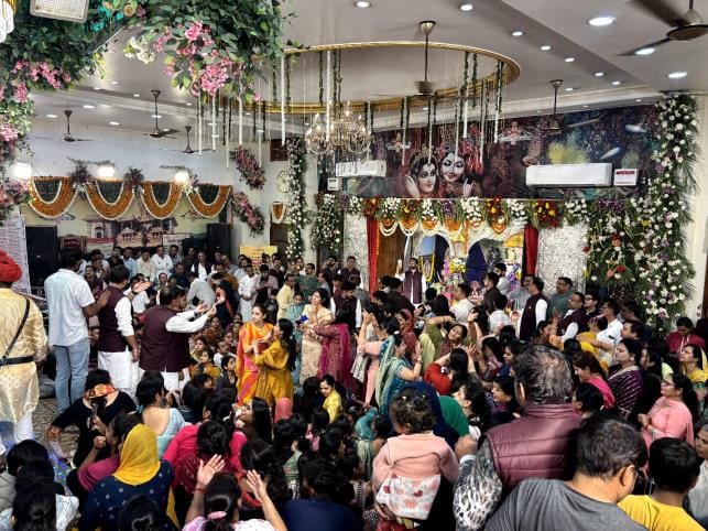 Devotees dancing during the Phalgun festival at the ancient Shri Shyam temple located in Nohariya Bazaar.