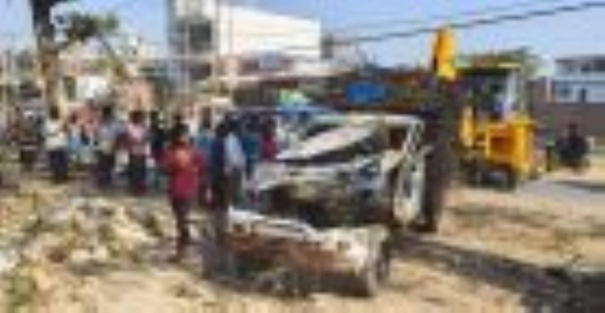 Pickup overturned after hitting an electric pole and tree