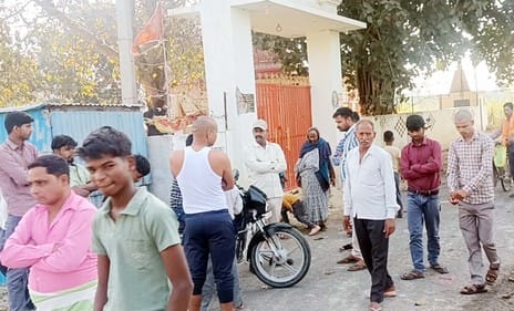 The stone plaque on the temple gate in Majidapur was broken
