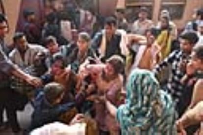 Women jostled to get on the train, kicked and punched each other