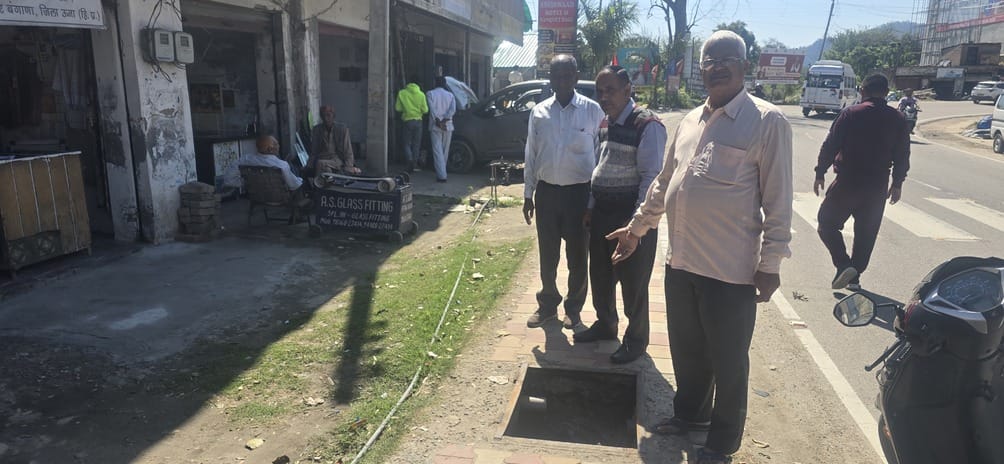 Danger of accident due to open chamber on footpath in Bangana