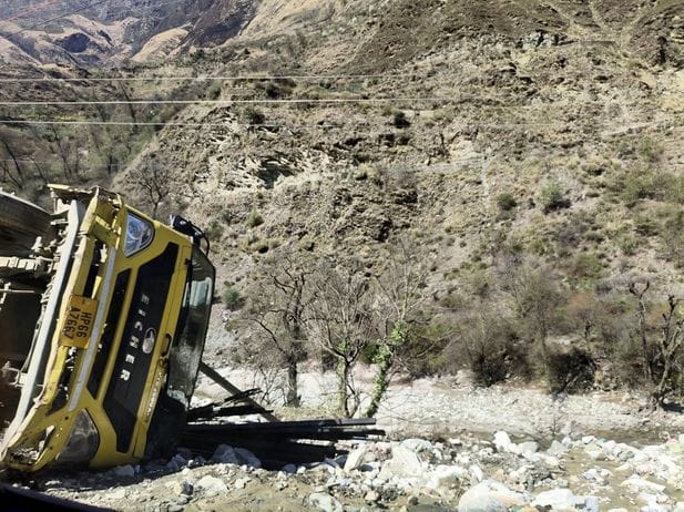 A truck loaded with iron angles overturned near Sharni