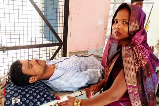 A young man sitting at the door of his house was shot with a gun due to enmity