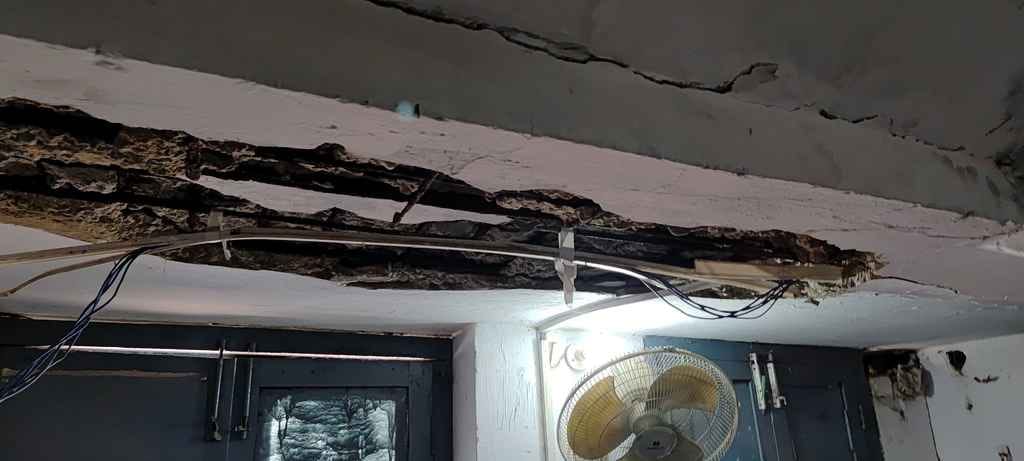 Ruined office, life in danger