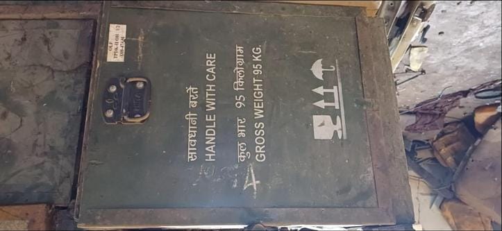 Where the stolen car was being dismantled, boxes containing army ammunition were found there