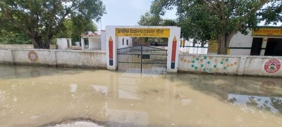 Flood waters surround schools, studies come to a halt
