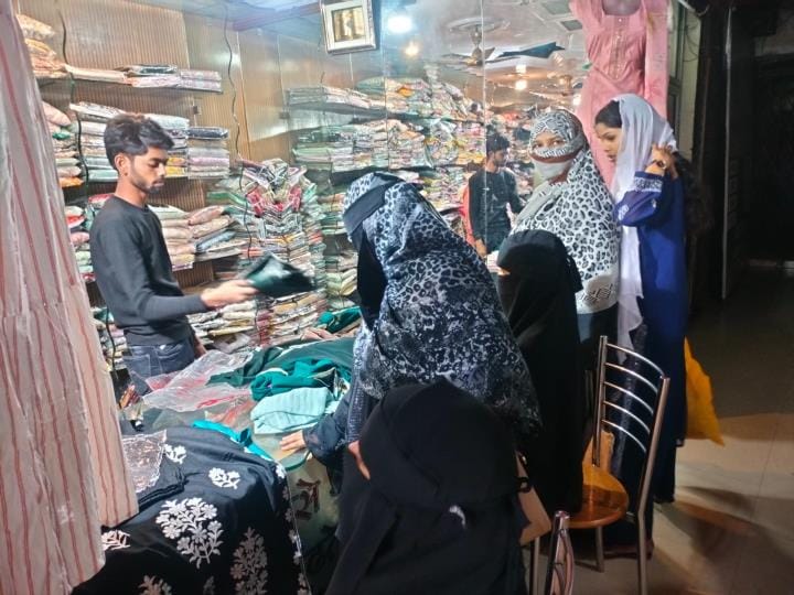 Women are liking fancy suits while children are liking jeans and T-shirts