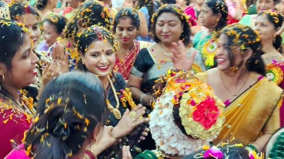 Played Holi of flowers with Radha-Krishna