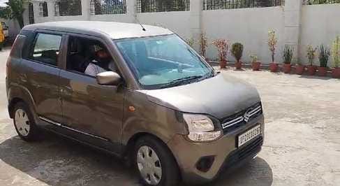 When the police issued a challan, he was driving the car wearing a helmet