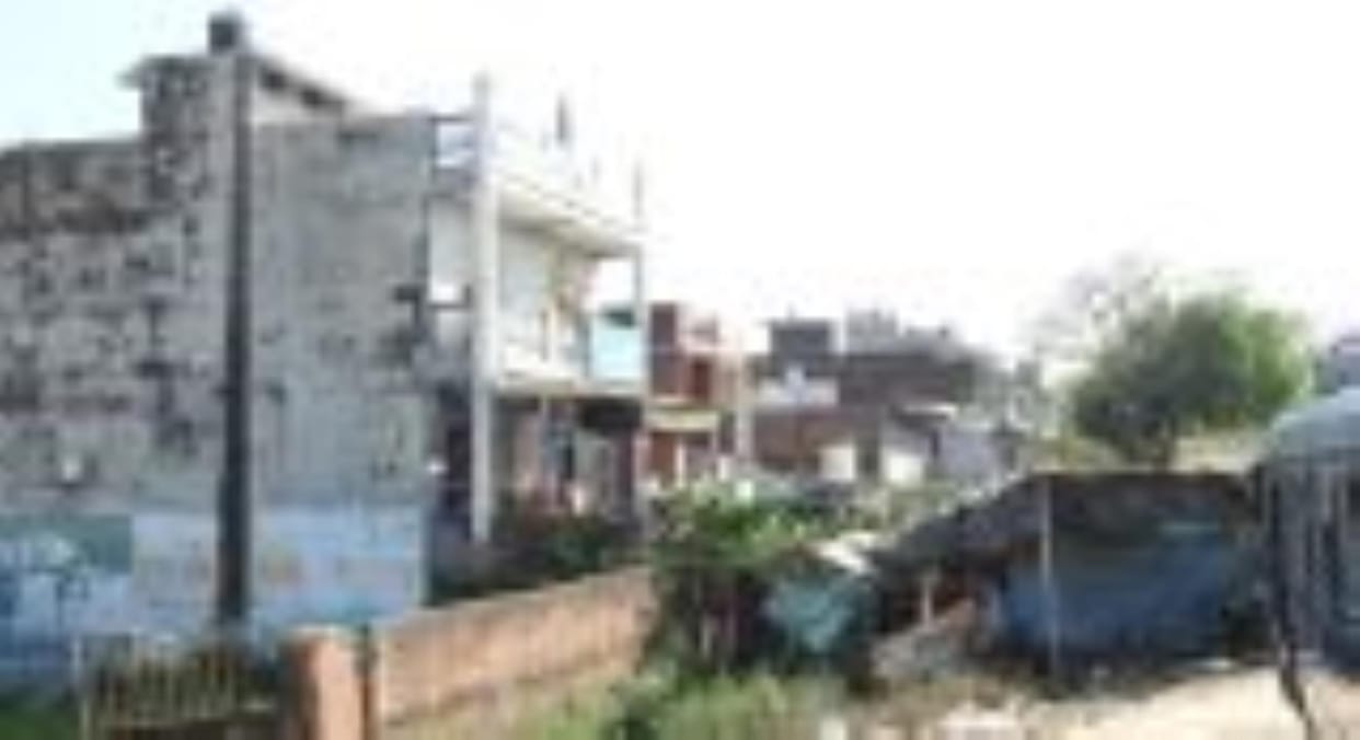 A house and shop were built on the drain land, bulldozer will be used