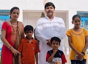 The wife and both sons kept writhing in pain, soaked in blood, while the boy sat nearby with a pistol
