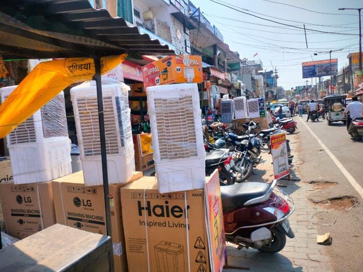 Shops and parking on the footpath, walking difficult in the city