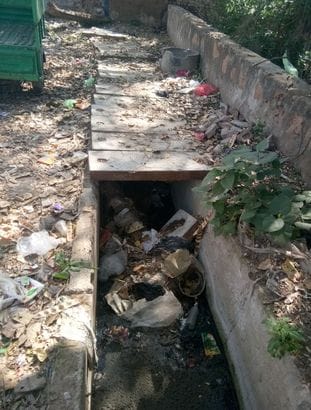 The drains were cleaned a year ago, now they are filled with bags