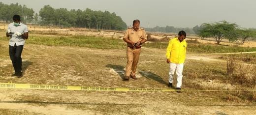 Forensic team investigating the dead body found in Siwan, east of Amardobha.