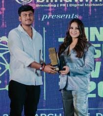 Kshitij honored for spreading awareness about yoga and education