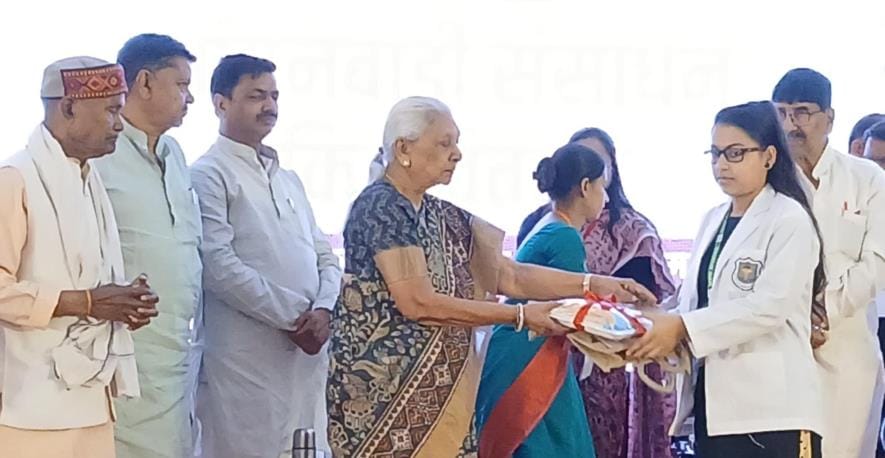 Face lit up after receiving honor from the governor