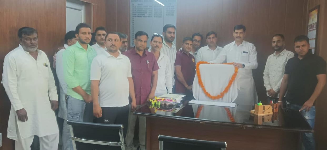 The vacant chair of the Zila Parishad CEO was garlanded with marigolds and roses were given to the employees.